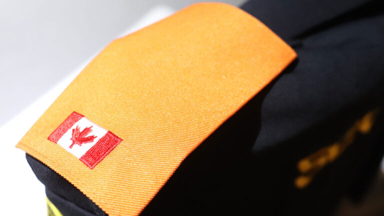 TrimTag created custom orange epaulettes to be worn on uniforms for the first National Day of Reconcilition